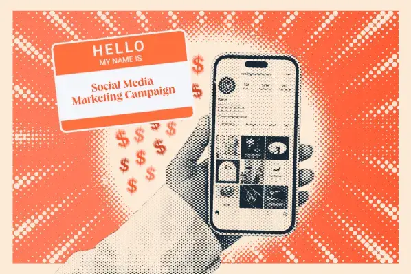 a hubspot-branded featured image of a hand holding a phone with an orange nametag next to it that says ‘hello my name is social media marketing campaign’ along with some dollar signs surrounding it
