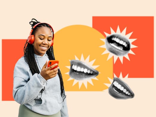 A woman smile at her phone as she watches an ad that is part of a cultural marketing campaign