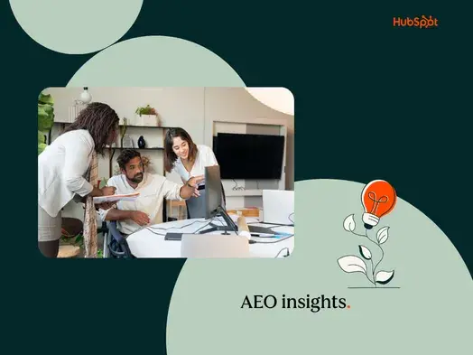 people in an office getting AEO insights from computer